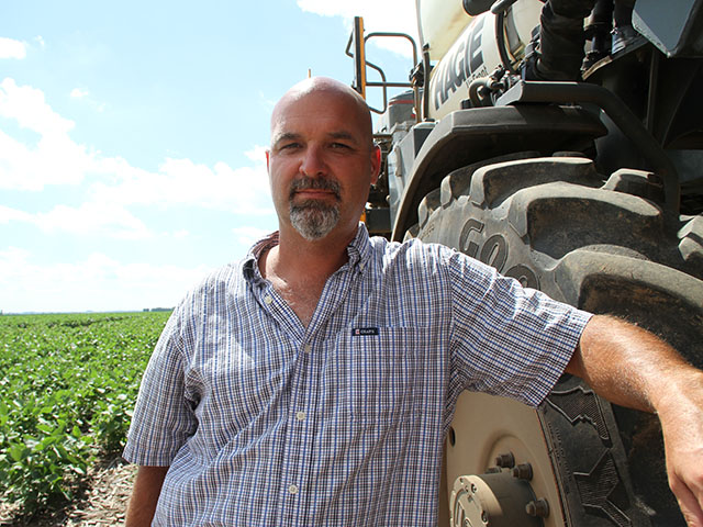 Recent approvals will allow Illinois farmer Kirk Martin to combine certain glyphosate herbicides into the tank as he sprays dicamba-tolerant soybeans. (DTN photo by Pamela Smith)
